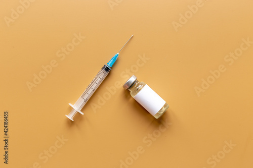 Vaccine in vial bottle with syringe. Vaccination concept