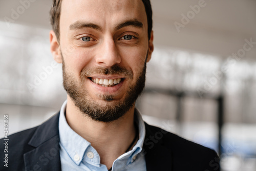 Close up of a smiling mid ages businessman