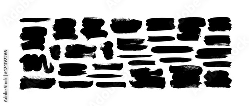 Vector black paint, ink brush strokes and lines. Dirty grunge design element, box or background for text. Grungy black smears and rough stains, lines. Hand drawn ink illustration isolated on white