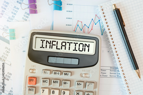 INFLATION word on calculator. Business concept