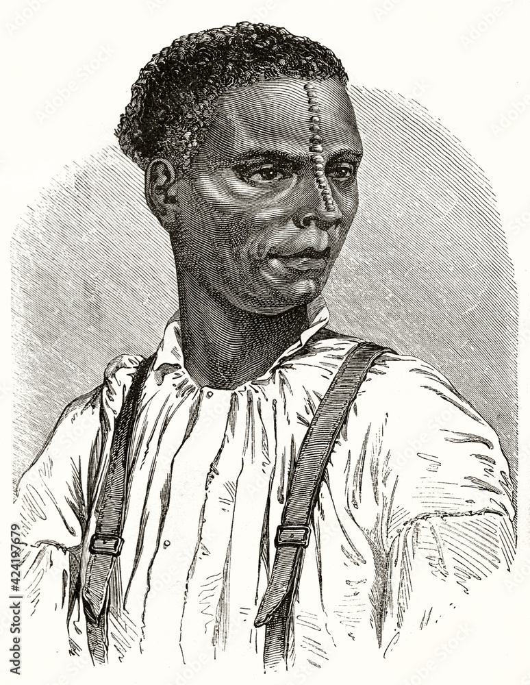 Obraz premium portrait of Yambane man with particular decoration starting from forehead and ending on top of nose, Reunion island. Ancient grey tone etching style art by Riou, Le Tour du Monde, 1862