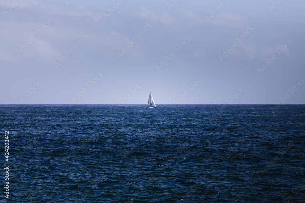 A sailboat on the Pacific Ocean