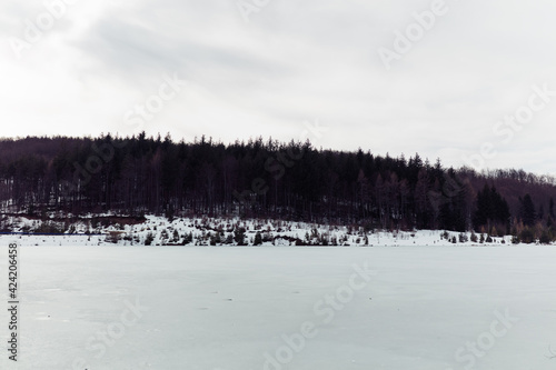 Frozen water surface of a lake. © astrosystem