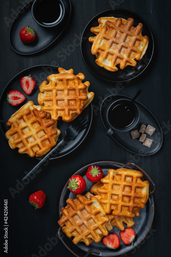 Waffle breakfast with strawberry and coffee..