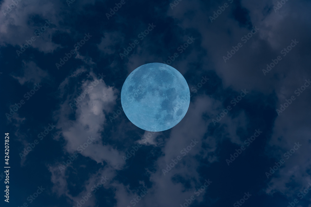 Fototapeta premium Full moon with clouds on the sky.