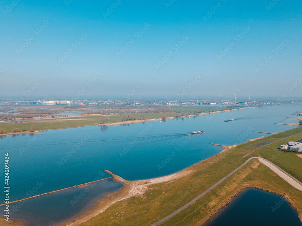 Aerial drone view of the big river or canal in the Netherlands