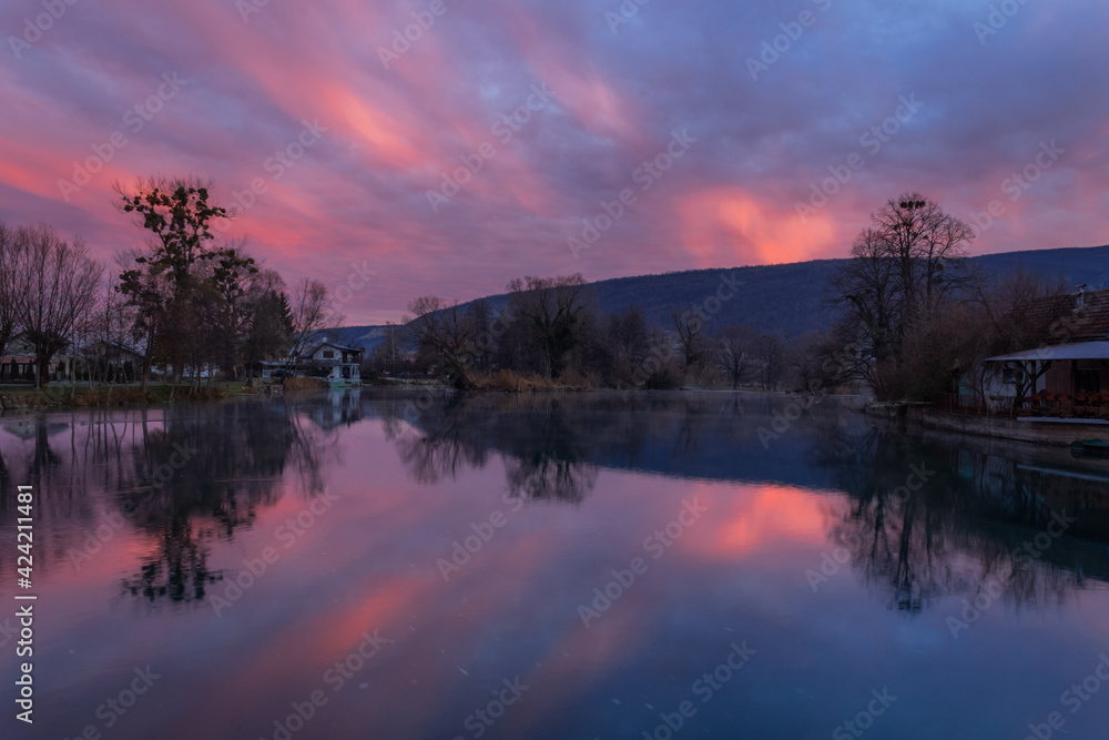 Obraz premium sunrise over the river