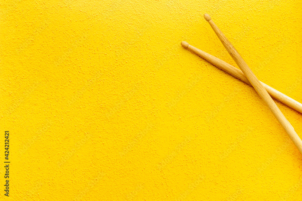 Top view of drum sticks with space for text. Music background Top view of drum sticks with space for text. Music background