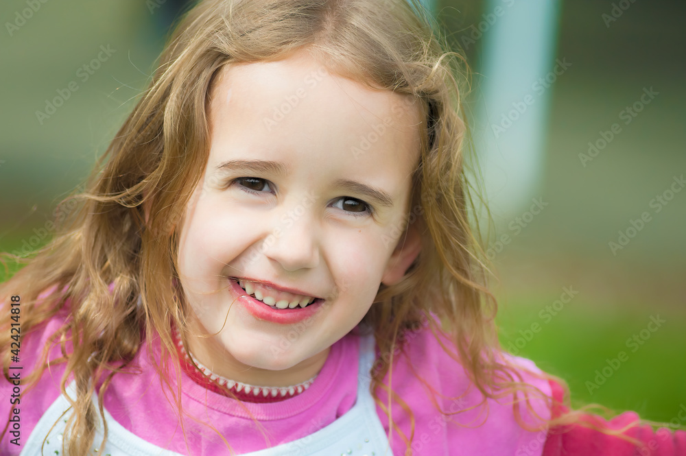 Close up of a smiling active little girl Close up of a smiling active little girl