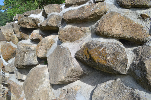 stone wall in the mountain for a background.