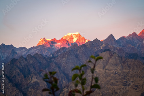 Mesmerizing view of Himalaya during sunset from Kuari pass hiking trail near Auli, Uttarakhand, India.