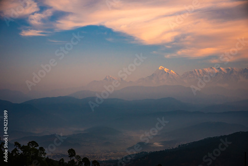 Panoramic landscape of great Himalayas mountain range during an autumn morning from Kausani also known as  Switzerland of India  a hill station in Bageshwar district  Uttarakhand  India.