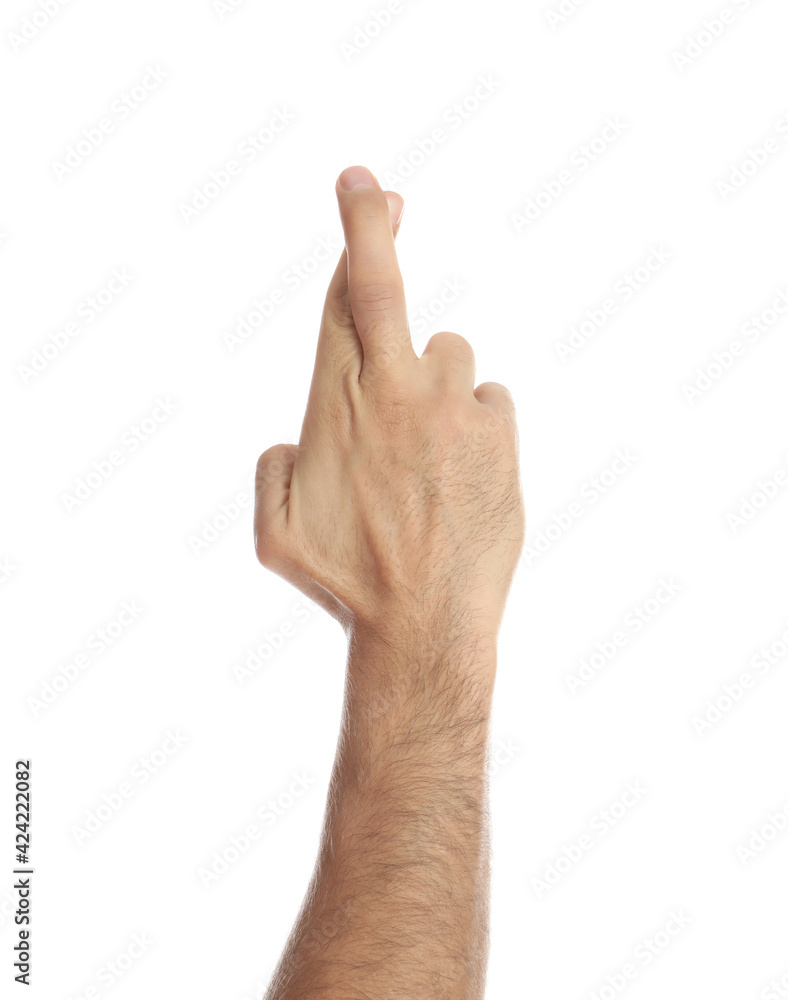 Man with crossed fingers on white background, closeup. Superstition concept Man with crossed fingers on white background, closeup. Superstition concept