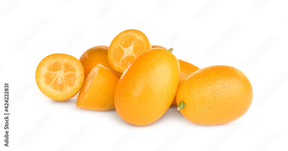 Whole and cut ripe kumquats on white background. Exotic fruit Whole and cut ripe kumquats on white background. Exotic fruit