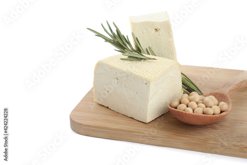 Pieces of delicious tofu with rosemary and soy on white background