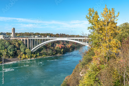 Rainbow bridge between USA and Canada and surrounding Niagara river shore © Blue Cat Studio