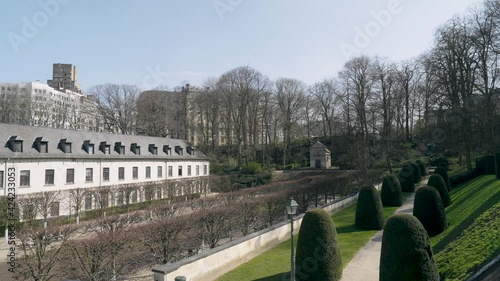 Gardens of La Cambre Abbey with the Promenade des Abbesses. Park in the style of French classicism with green alleys and terraces photo