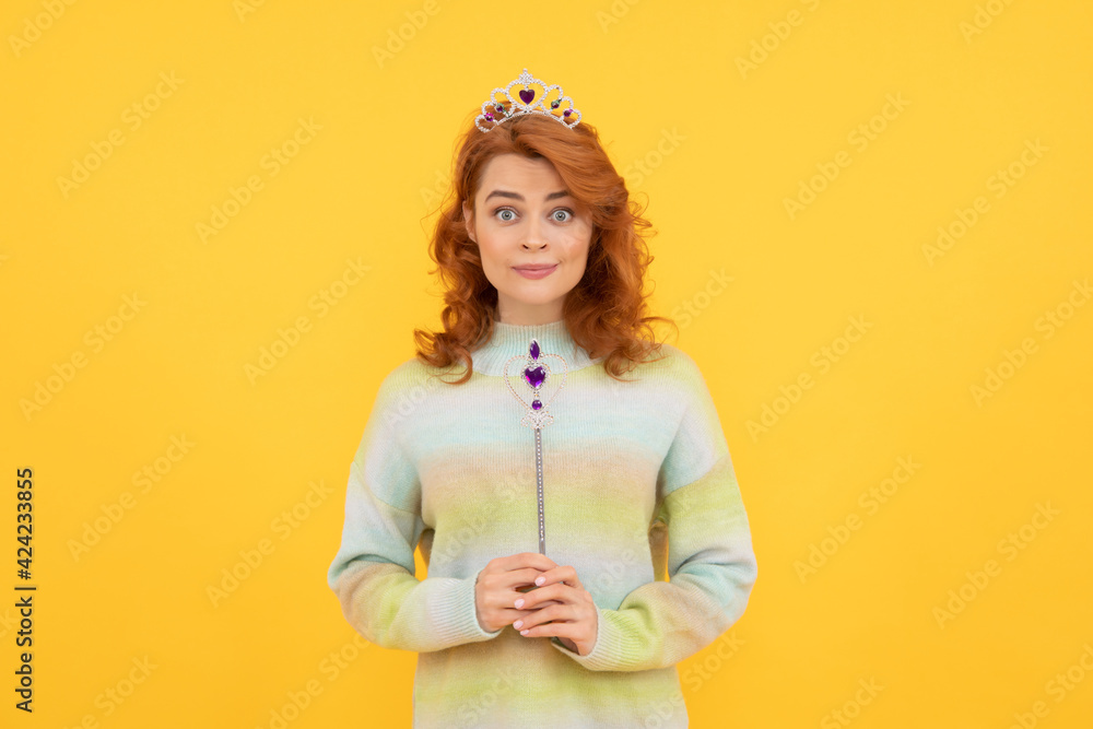 amazed woman holding magic stick. egoistic girl wear diadem. arrogance and selfishness. amazed woman holding magic stick. egoistic girl wear diadem. arrogance and selfishness.