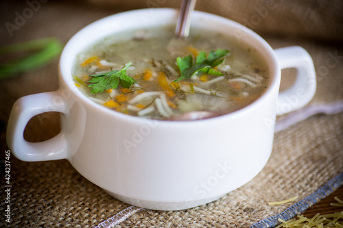cooked hot soup with noodles and vegetables