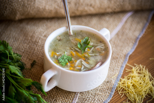 cooked hot soup with noodles and vegetables