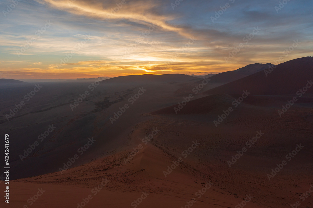 sunset in the desert of namibia