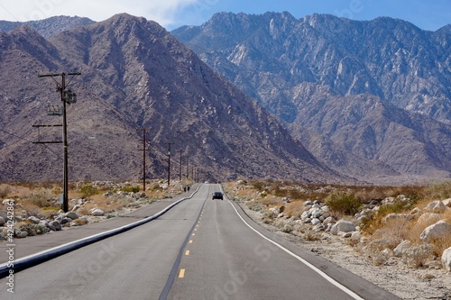 Road in Coachella Valley in Colorado Desert near Palm Springs with San Jacinto Mountains photo