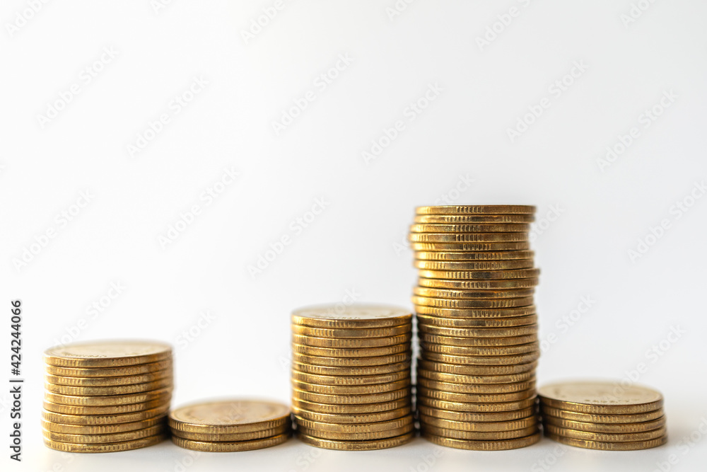 Money and Financial Concept. Closeup of stack of gold coins on white background. Money and Financial Concept. Closeup of stack of gold coins on white background.