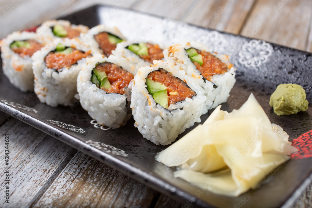 A closeup view of a spicy tuna roll.