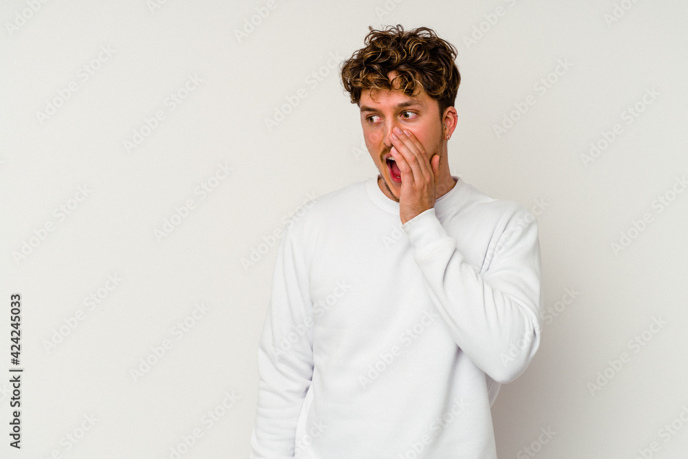 Young caucasian man isolated on white background shouting excited to front. Young caucasian man isolated on white background shouting excited to front.