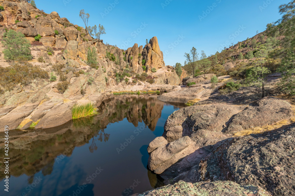 Lake Bear Gulch and rock formations in Pinnacles National Park in California, the ruined remains of an extinct volcano on the San Andreas Fault. Beautiful landscapes