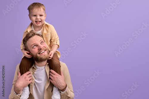 Bearded Caucasian Father Playing With Son, Children and Family Concept