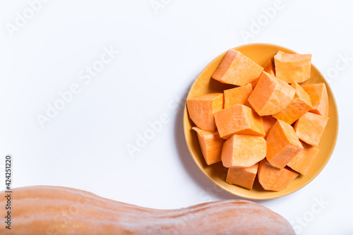 Pieces of pumpkin on a plate. Sweet yamy pumpkin. photo