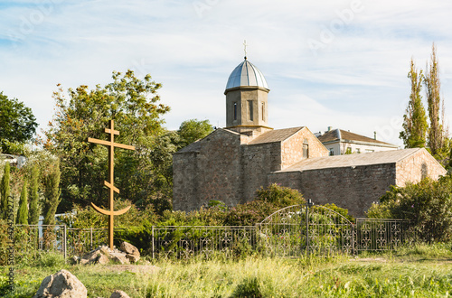 Memorial cross with a crescent moon at the bottom of the church of the Iveron Icon of the Mother of God Feodosia photo