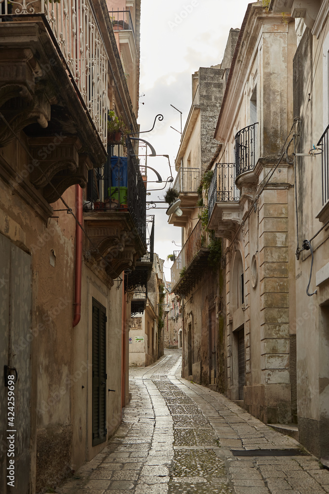 Ragusa. City in Sicily. Italy. Alley without people. Before Corona. It is one of the late Baroque towns of the Val di Noto, declared a UNESCO World Heritage Site in 2002.