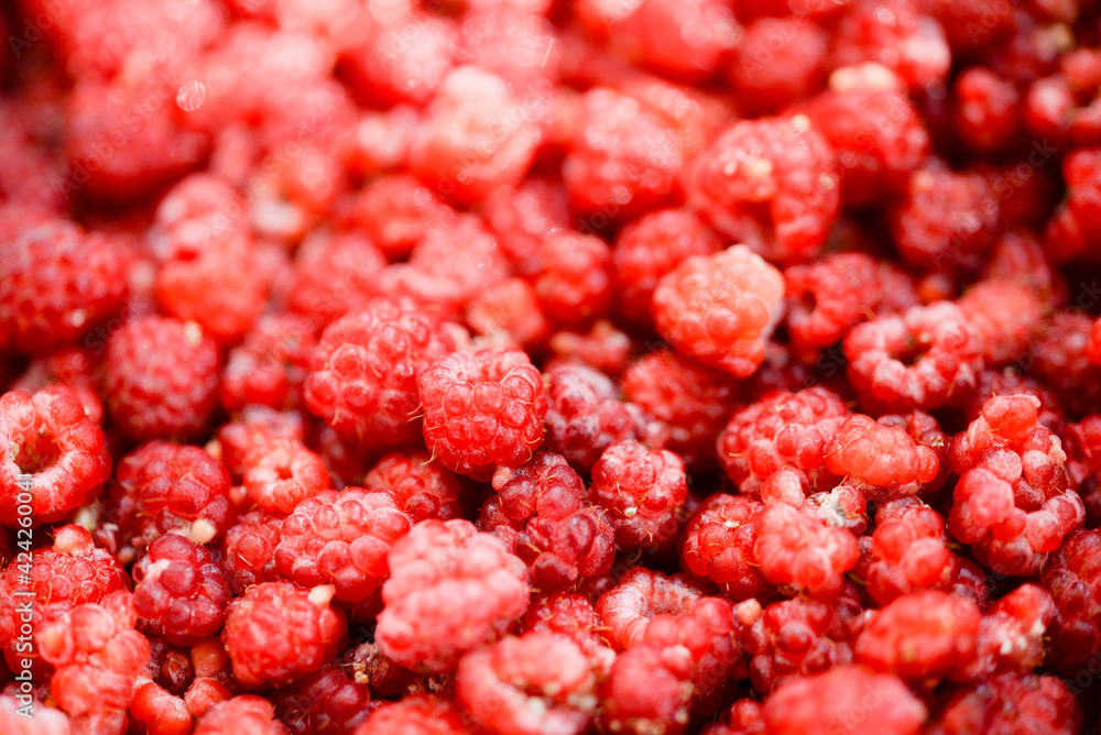 Background of fresh ripe raspberries Background of fresh ripe raspberries