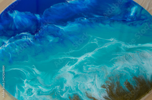 Epoxy resin. Imitation of the sea. Sea foam. Modern rendy hobby.