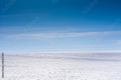 Landscape with snow and blue sky