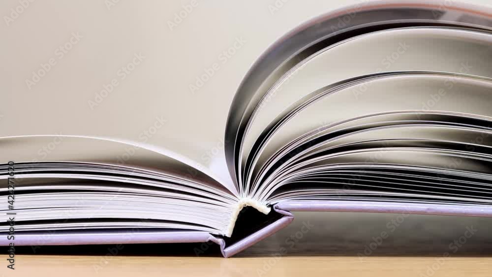 Book pages are turned from beginning to end - stop motion. Book pages are turned from beginning to end - stop motion.