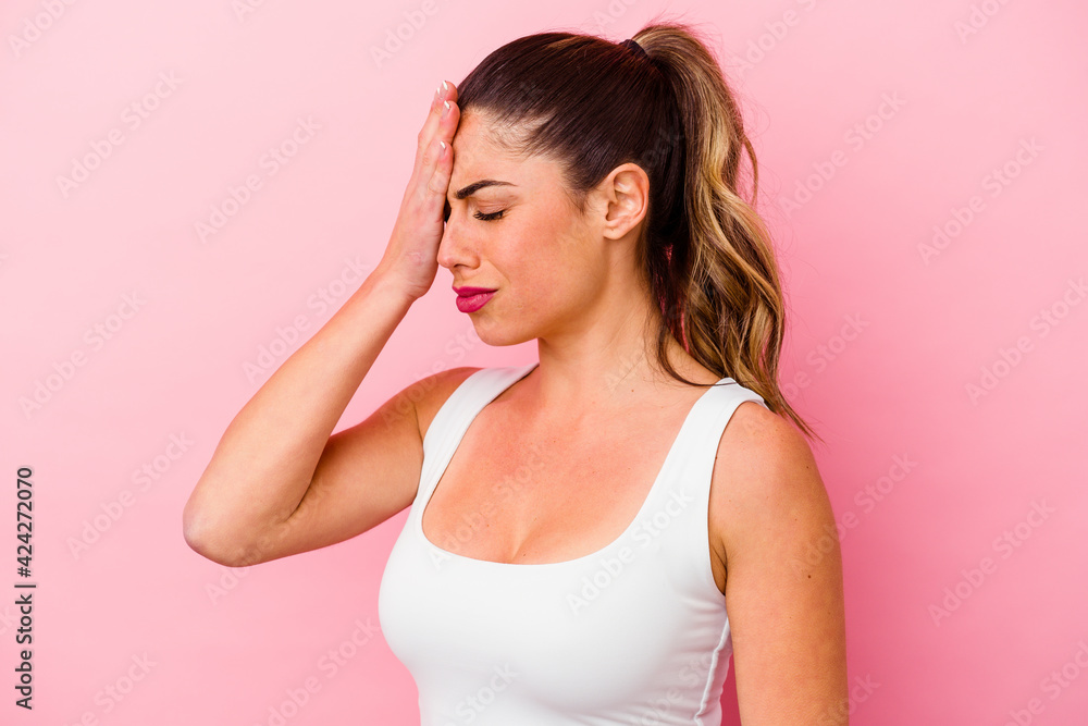Young caucasian woman isolated on pink background Young caucasian woman isolated on pink background