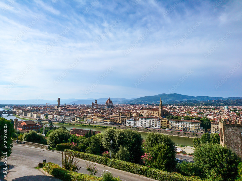 Panoramic cityscape of Florence on Arno river. Famous Cathedral, Basilicas, churches etc from Michelangelo terrace square point. Sunny summer day view