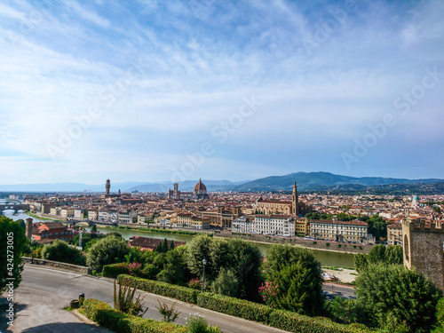 Panoramic cityscape of Florence on Arno river. Famous Cathedral, Basilicas, churches etc from Michelangelo terrace square point. Sunny summer day view © Kathrine Andi
