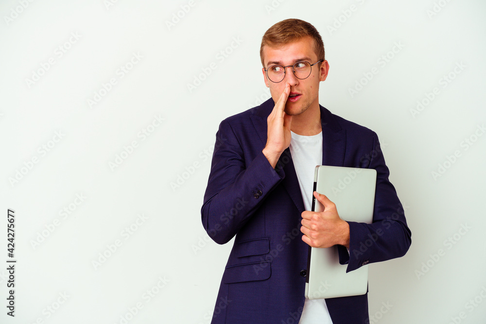 Young business caucasian man holding a laptop isolated on white background Young business caucasian man holding a laptop isolated on white background