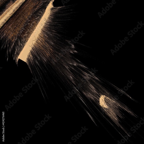 exploding 3d surface in shades of copper tawny brown orange and grey colours on a black background
