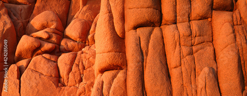 Roter Fels Stein Hintergrund von Arbatax, Sardinien als Hintergrund., Italien.  photo