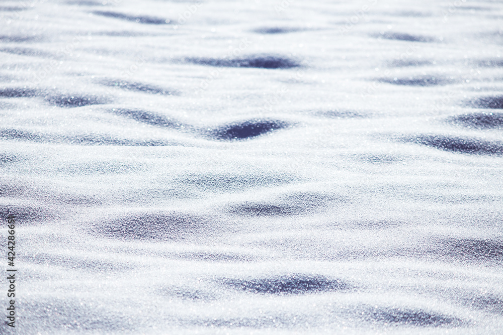 Close up of snow particles and flakes. Winter snow background Close up of snow particles and flakes. Winter snow background