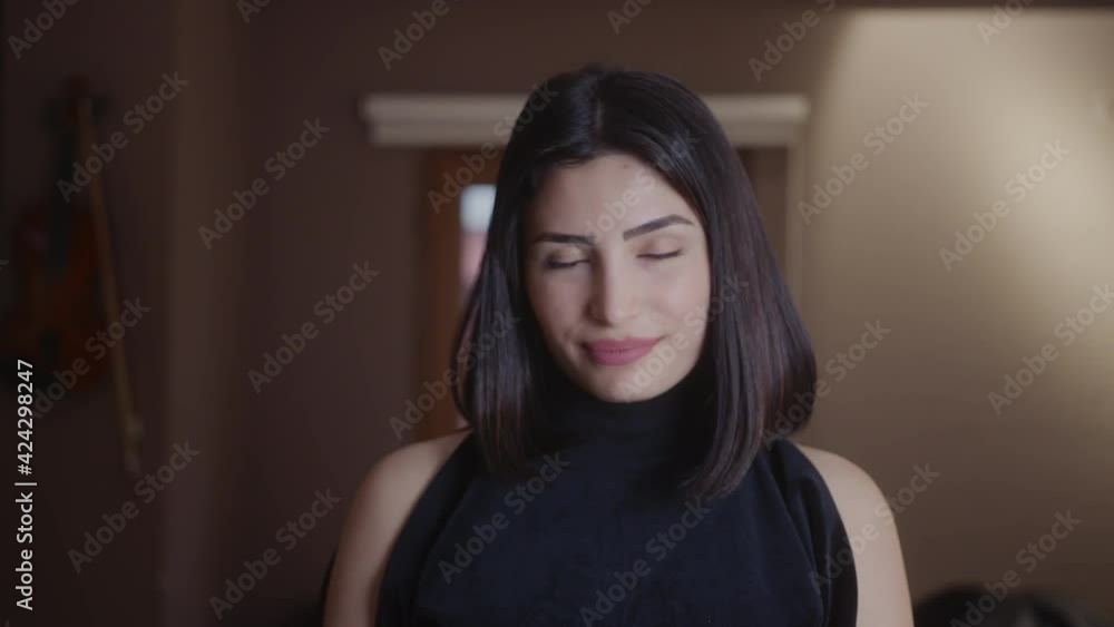 Beautiful attractive woman looking at the camera and posing, lifestyle and fashion concept Beautiful attractive woman looking at the camera and posing, lifestyle and fashion concept