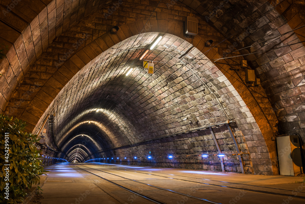Illuminated Tramway Tunnel at Night in Bratislava, Slovakia