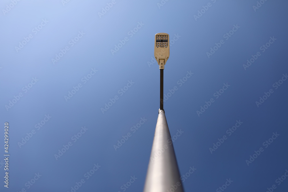 Lamppost on blue sky background. modern lamppost. copy spece Lamppost on blue sky background. modern lamppost. copy spece