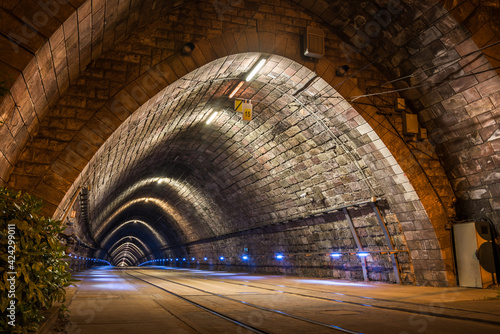 Obraz na płótnie Illuminated Tramway Tunnel at Night in Bratislava, Slovakia w salonie