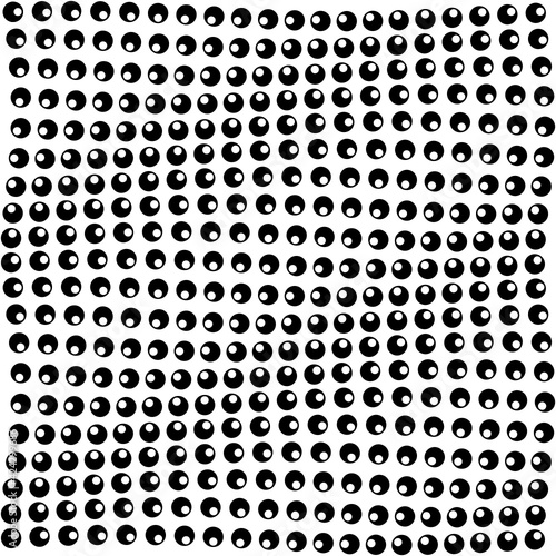 Esferas en blanco y negro creando un efecto de movimiento